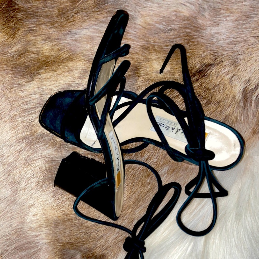 Black Suede w/suede strings to tie around ankle & leg 3 1/2” think heel.